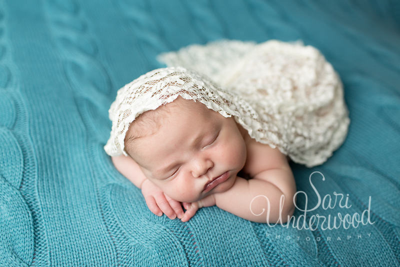 beautiful baby girl in teal and ivory lace